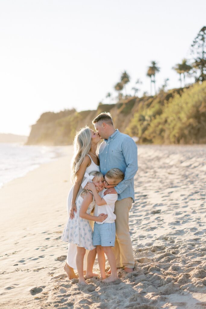 
What to Wear for Family Photos (Family of 4 Outfit Ideas + Style Guide), family of four outfit ideas for outdoor photos, coordinated family photo outfits in neutral tones, what to wear for family photos with soft color palette, casual family outfits with denim and neutrals, fall family photo outfits with warm colors and layers, summer family photo outfits with light fabrics, cozy winter family outfits with textures, neutral outfit ideas for family photoshoot, family of four photoshoot outfit 