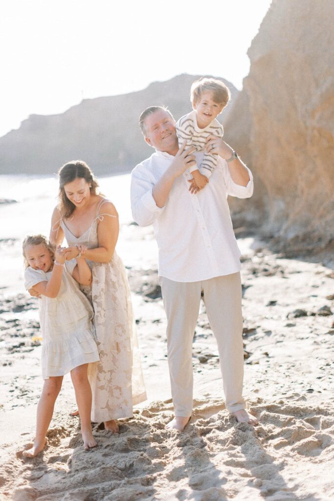 What to Wear for Family Photos (Family of 4 Outfit Ideas + Style Guide), family of four outfit ideas for outdoor photos, coordinated family photo outfits in neutral tones, what to wear for family photos with soft color palette, casual family outfits with denim and neutrals, fall family photo outfits with warm colors and layers, summer family photo outfits with light fabrics, cozy winter family outfits with textures, neutral outfit ideas for family photoshoot, family of four photoshoot outfit