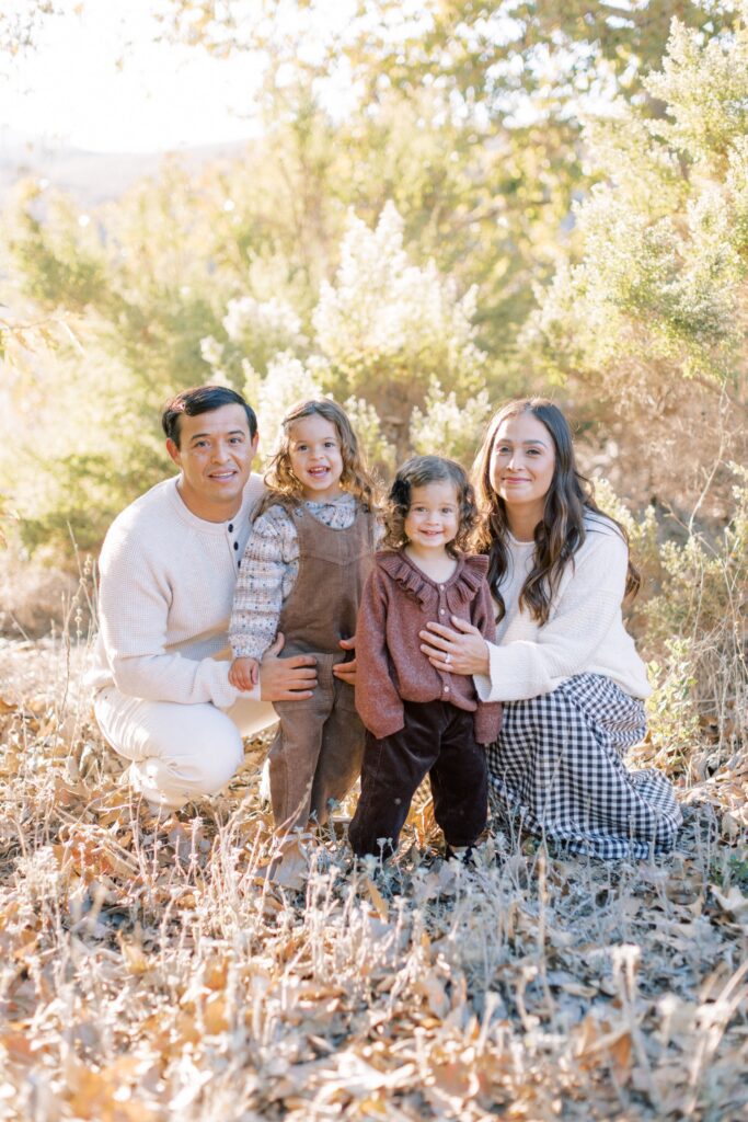 What to Wear for Family Photos (Family of 4 Outfit Ideas + Style Guide), family of four outfit ideas for outdoor photos, coordinated family photo outfits in neutral tones, what to wear for family photos with soft color palette, casual family outfits with denim and neutrals, fall family photo outfits with warm colors and layers, summer family photo outfits with light fabrics, cozy winter family outfits with textures, neutral outfit ideas for family photoshoot, family of four photoshoot outfit