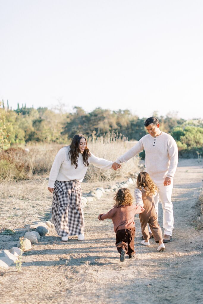 What to Wear for Family Photos (Family of 4 Outfit Ideas + Style Guide), family of four outfit ideas for outdoor photos, coordinated family photo outfits in neutral tones, what to wear for family photos with soft color palette, casual family outfits with denim and neutrals, fall family photo outfits with warm colors and layers, summer family photo outfits with light fabrics, cozy winter family outfits with textures, neutral outfit ideas for family photoshoot, family of four photoshoot outfit