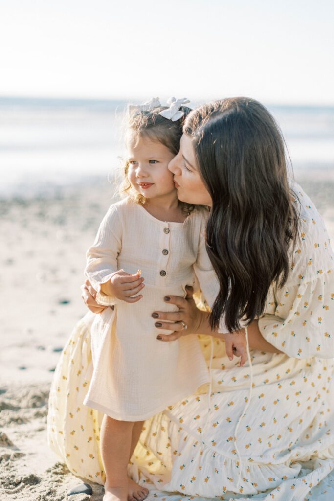 Family of four smiling together during fall family photos in Ventura County, holiday photos of kids together with christmas tree Thousand Oaks, candid shots of family fall photos, santa holiday mini sessions, fall candid mini sessions ventura county, christmas tree family session in ventura county, fall beach photos of family together in Los Angeles, beach photos of kids in fall San Diego, gingerbread making holiday photos in Thousand Oaks, holiday mini session photos in Los Angeles